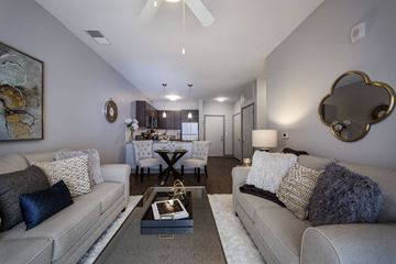 South Bend apartment for rent - a living room with couches and a coffee table