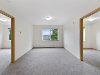 Carpeting in living room and bedrooms
