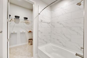 Deep soaker style bathtubs