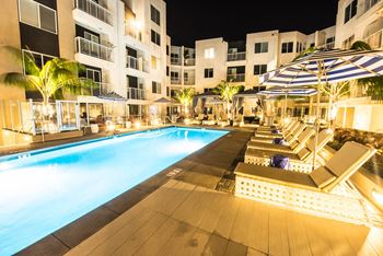 Resort-style pool with cabanas