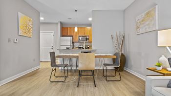 Wood-style flooring in kitchen and living areas*