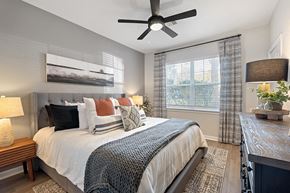 Lawrence apartment for rent - Bedroom with ceiling fan at River Pointe at Den Rock Park in Lawrence MA