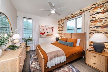 Lighted ceiling fans in living and main bedroom areas