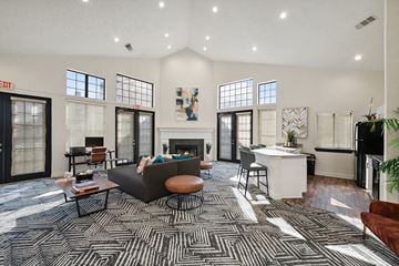 Dallas apartment for rent - a living room with a couch and a table