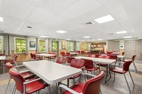 Aberdeen apartment for rent - Community lounge and kitchen at Fairbrooke Senior Apartments in Aberdeen MD