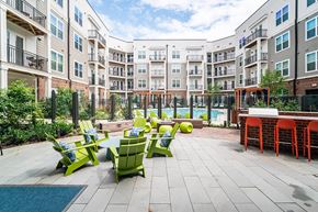Alexandria apartment for rent - Courtyard seating and grill at The Belhaven in Alexandria VA