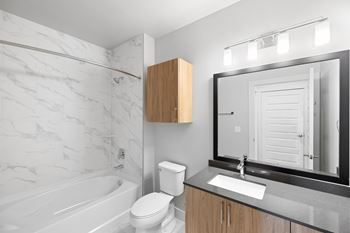 Bathtub with ceramic tile surround