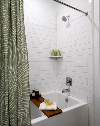 Bathtub with ceramic tile surround