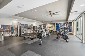 Tempe apartment for rent - A spacious gym with a variety of exercise equipment.
