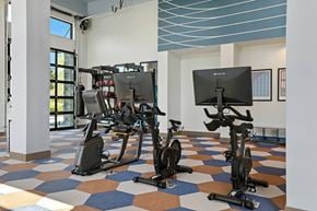 Woburn apartment for rent - Fitness center bikes at Station 316 Woburn MA