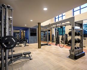 Gaithersburg apartment for rent - Fitness center weights at 333 Ellington Apartments in Gaithersburg MD