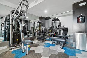 Chelsea apartment for rent - Fitness center weights at Axis Admiral Hill Apartments in Chelsea MA