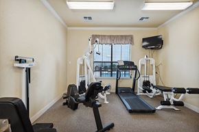 Pasadena apartment for rent - Fitness room with machines at Parkway Senior Apartments in Pasadena TX