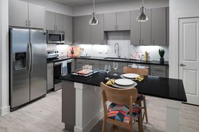 Plano apartment for rent - Kitchen island at Jada Legacy Central Apartments in Plano TX
