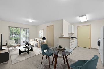 Lynnwood apartment for rent - A modern living room with a glass table and chairs.