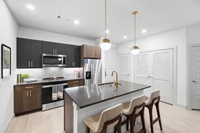 Houston apartment for rent - Model Concrete Design Package Kitchen Angled at East Bend Apartments in Houston TX