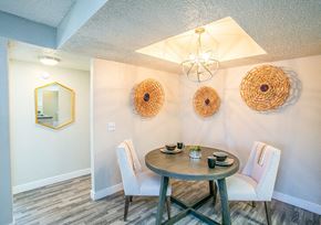 Las Vegas apartment for rent - a dining room with a table and chairs