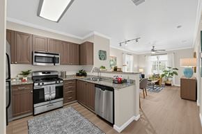 San Jose apartment for rent - Kitchen and living room at The Verdant Apartments in San Jose CA