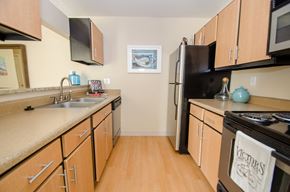 Longmont apartment for rent - Model kitchen at Rock Peak on Sunset Apartments in Longmont CO