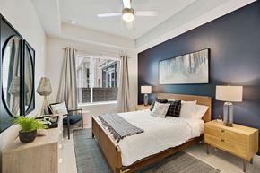 Houston apartment for rent - Model Sandalwood Design Package Bedroom at 1810 Main Apartments in Houston TX