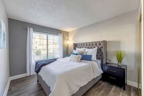 Las Vegas apartment for rent - Bedroom with wood style flooring at Kaleidocope Apartment Homes in Las Vegas NV