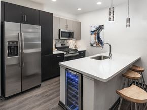 Tempe apartment for rent - Model ktichen with island seating at Norte Town Lake Apartments in Tempe Arizona