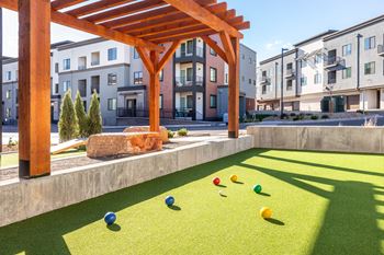 Outdoor game lawn with cornhole boards
