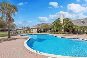 Fort Worth apartment for rent - Swimming pool sun deck at Ironwood Crossing Apartments and Townhomes in Fort Worth TX