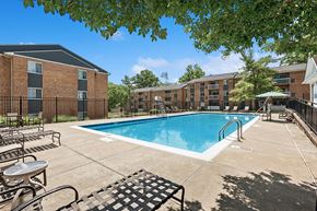 Gaithersburg apartment for rent - Pool and chairs at Parklane Apartments in Gaithersburg MD
