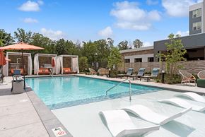 Milford apartment for rent - Pool and tanning shelf at The Quill Apartments in Milford MA