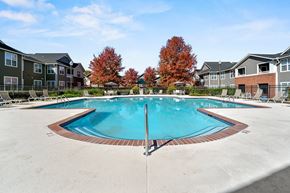 Chester apartment for rent - Pool surrounded by deck at Grand Oaks Apartments in Chester VA