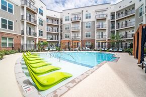 Alexandria apartment for rent - Outdoor pool and tanning chairs at The Belhaven in Alexandria VA