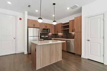 Kitchen island with modern pendant lighting
