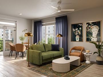 South Walpole apartment for rent - A living room with a green couch and a white coffee table.