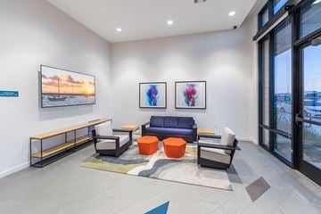 Fremont apartment for rent - a living room with a couch and chairs and a window
