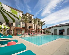 Camarillo apartment for rent - Poolside seating at CALIXA Apartment Homes in Camarillo CA