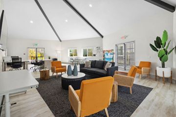 San Diego apartment for rent - a living room with a couch and chairs and a table