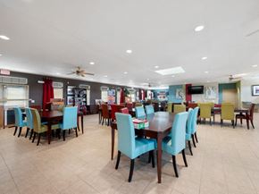 Houston apartment for rent - Social lounge chairs and tables at Parkway Ranch Rental Homes in Houston TX