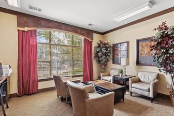 Atlanta apartment for rent - a living room with furniture and a large window