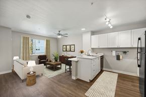 Auburn apartment for rent - Model Kitchen and Living Room at Auburn Court Apartments in Auburn WA