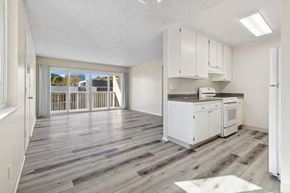 San Diego apartment for rent - Dining Area and Living Room at Canyon Rim Apartments in San Diego CA