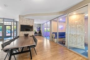 Alexandria apartment for rent - Resident clubhouse with conference table at Bradley Braddock Road Station Apartments in Alexandria VA
