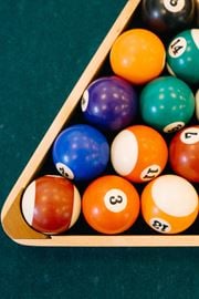 Roseland triplex for rent - a set of billiard balls on a pool table