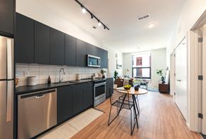 Detroit apartment for rent - a kitchen and living room in an apartment