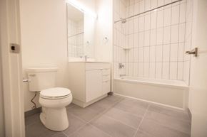 Detroit apartment for rent - a bathroom with a toilet sink and bathtub