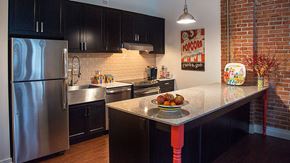 Detroit apartment for rent - Kitchen with Appliances at The Malcomson, Michigan, 48226