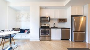 Detroit apartment for rent - Fully equipped kitchen with stainless steel appliances includes refrigerator, stove, and dishwasher, at The Stott.