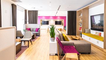 Detroit apartment for rent - a living room filled with furniture and a tv