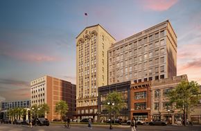 Detroit apartment for rent - A rendering of a city street scene with people walking and The Belle with a flag on top.