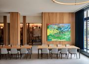 Detroit apartment for rent - a shared amenity conference room table and chairs and a painting on the wallat Book Tower, Michigan, 48226